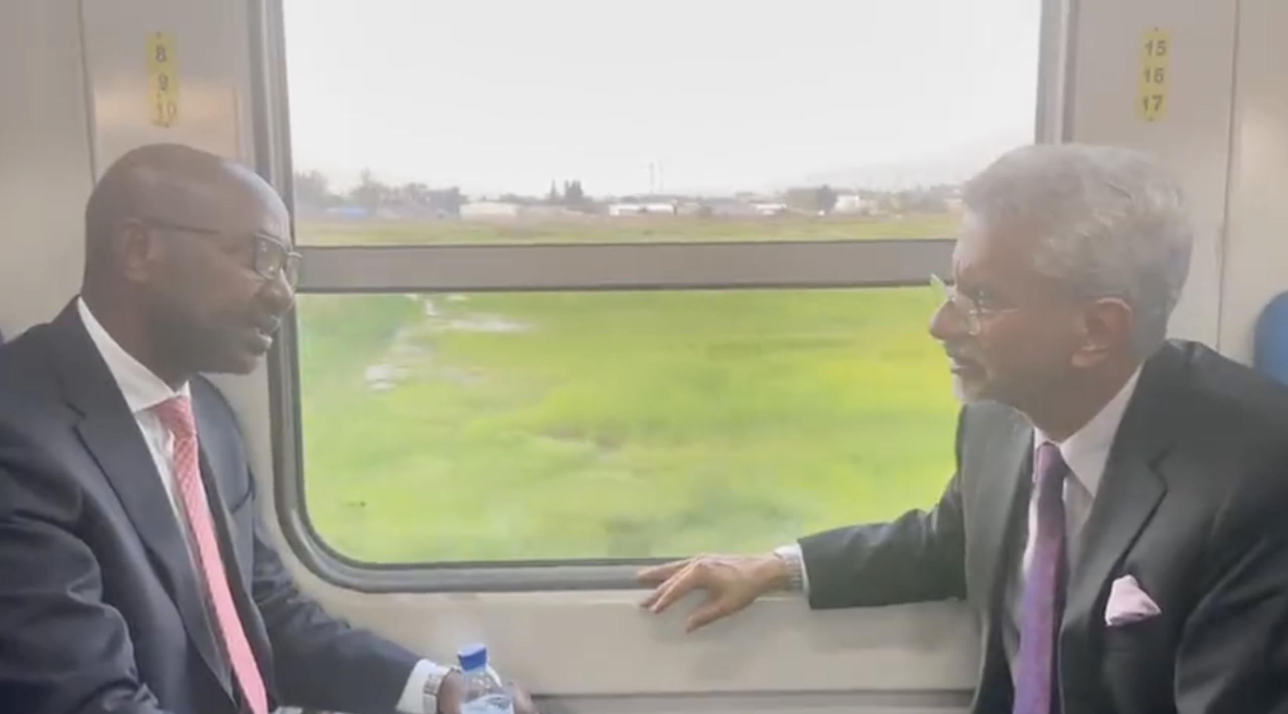 EAM and Mozambican Transport Minister ride in a Made in India train